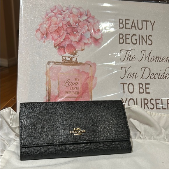 Coach Handbags - Coach NWOT Black Leather Wallet Sleek Design